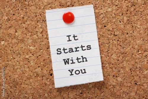 Photo: It Starts with You typed on paper on a cork notice board It Starts with You typed on paper on a cork notice board