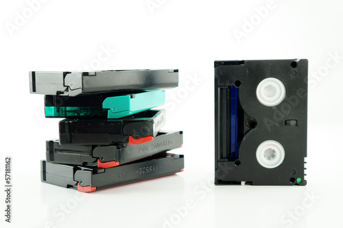 Photo: old VHS video cassettes isolated on white with clipping path old VHS video cassettes isolated on white with clipping path