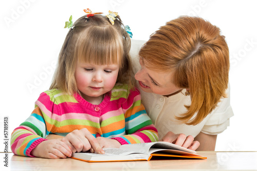 Photo: mom reading to kid a book mom reading to kid a book