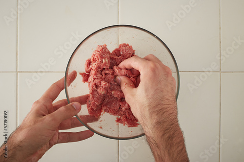 Photo: Cook hands making meatballs Cook hands making meatballs