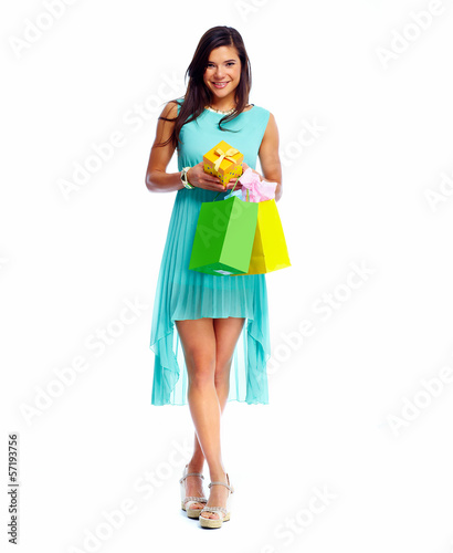 Photo: Happy shopping girl with christmas gift. Happy shopping girl with christmas gift.