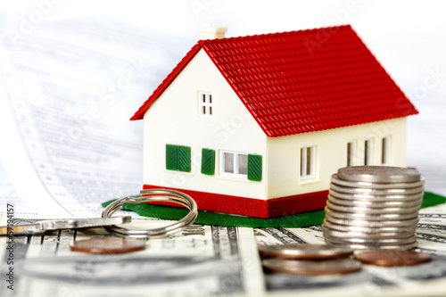 Photo: Family house and money. Family house and money.