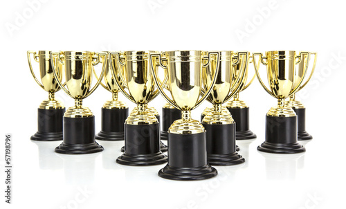 Photo: Gold Trophys on a white background Gold Trophys on a white background