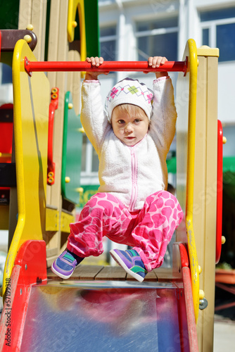 Photo: toddler girl on the playground toddler girl on the playground