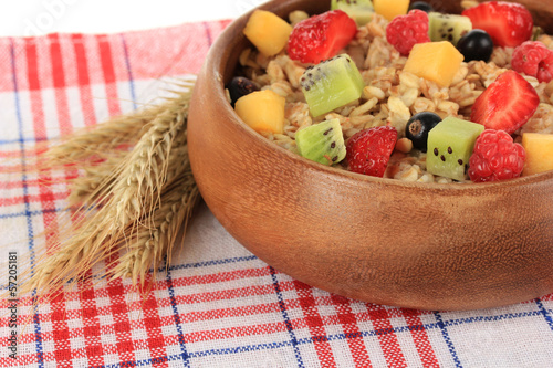 Photo: Oatmeal with fruits close-up Oatmeal with fruits close-up
