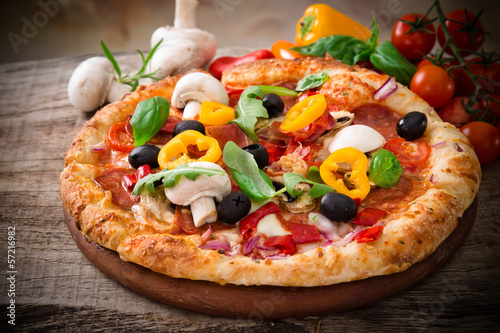 Photo: Delicious italian pizza Delicious italian pizza