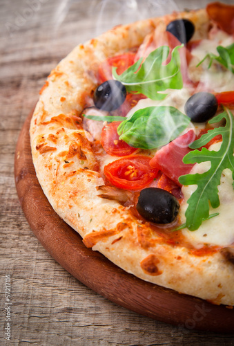 Photo: Delicious italian pizza Delicious italian pizza