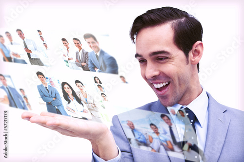 Photo: Pleased man admiring pictures Pleased man admiring pictures