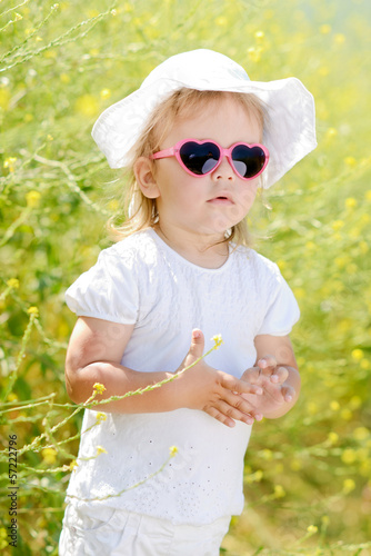 Photo: toddler in the yellow rape field toddler in the yellow rape field