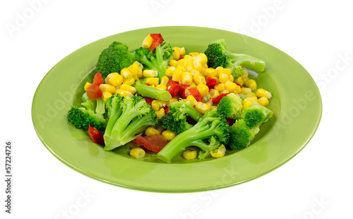 Photo: Cooked vegetables on a green plate Cooked vegetables on a green plate
