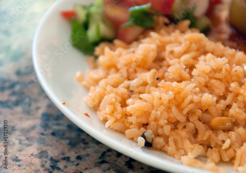 Photo: delicious pilaf on a plate delicious pilaf on a plate