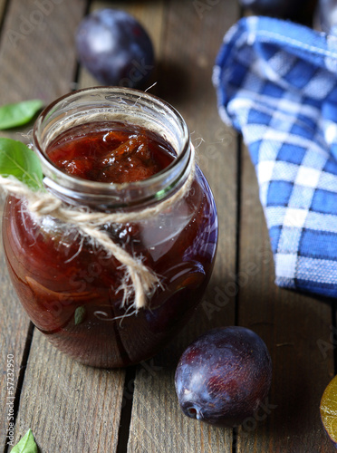 Photo: Plum jam in a transparent jar Plum jam in a transparent jar