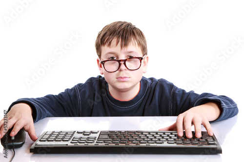 Photo: portrait of a teenager with a keyboard portrait of a teenager with a keyboard