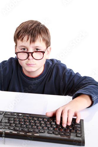 Photo: portrait of a teenager with a keyboard portrait of a teenager with a keyboard