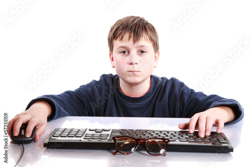Photo: portrait of a teenager with a keyboard portrait of a teenager with a keyboard