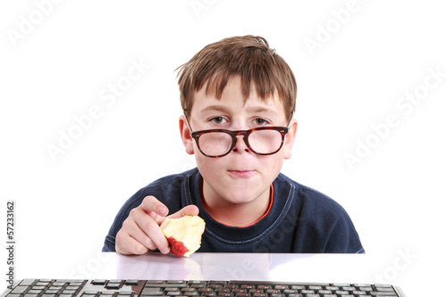 Photo: portrait of a teenager with a keyboard portrait of a teenager with a keyboard