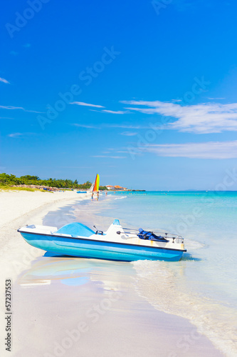 Photo: Varadero beach in Cuba with a paddle boat in the foreground Varadero beach in Cuba with a paddle boat in the foreground