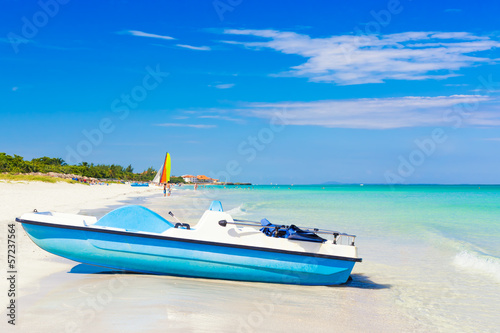 Photo: Varadero beach in Cuba with a paddle boat Varadero beach in Cuba with a paddle boat
