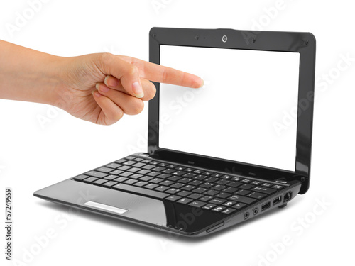 Photo: Notebook computer and pointing hand Notebook computer and pointing hand