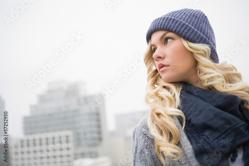 Photo: Thoughtful gorgeous blonde posing outdoors Thoughtful gorgeous blonde posing outdoors