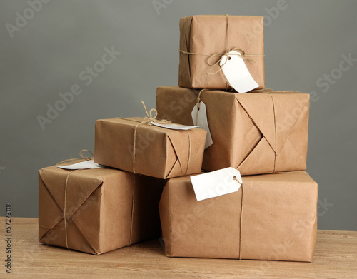Photo: parcels boxes with kraft paper, parcels boxes with kraft paper,