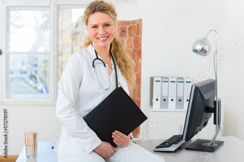 Photo: doctor with test result in document or dossier doctor with test result in document or dossier