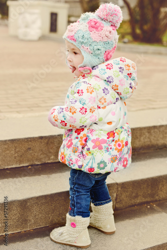 Photo: baby girl near staircase baby girl near staircase