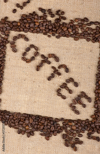 Photo: "Coffee" word made of coffee beans with a frame of beans "Coffee" word made of coffee beans with a frame of beans
