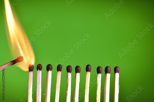 Photo: concept with matches- chain reaction concept with matches- chain reaction