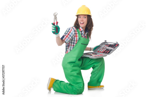 Photo: Young woman with toolkit on white Young woman with toolkit on white