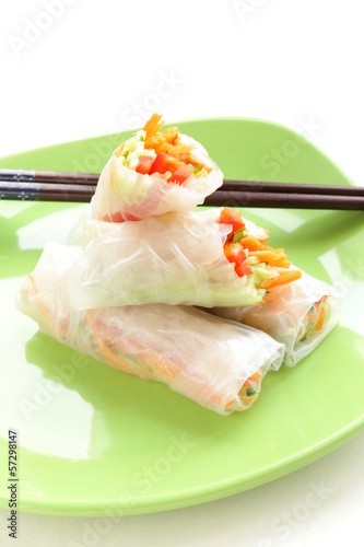 Photo: spring rolls with vegetables and chicken on a plate spring rolls with vegetables and chicken on a plate