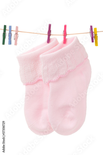 Photo: baby socks with pink clothespins baby socks with pink clothespins