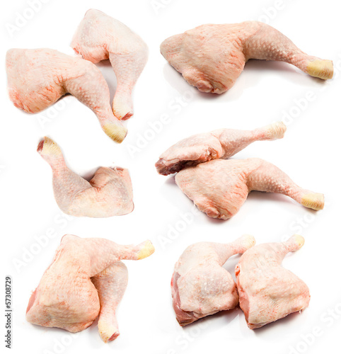 Photo: raw chicken legs on a white background raw chicken legs on a white background