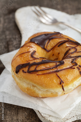 Photo: Donut mit Schokoladenüberzug Donut mit Schokoladenüberzug