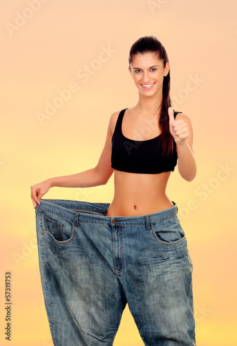 Photo: Slim woman with huge pants Slim woman with huge pants