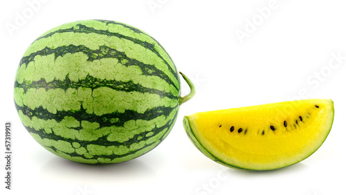 Photo: yellow water melon on white background yellow water melon on white background