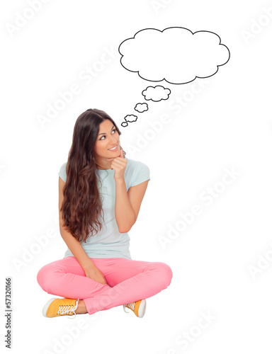 Photo: Pensive girl sitting on the floor Pensive girl sitting on the floor