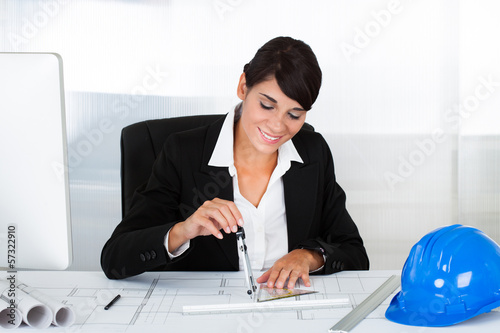 Photo: Female Architect With Blue Print Female Architect With Blue Print