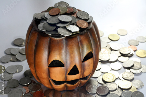 Photo: pumpkin and coin pumpkin and coin
