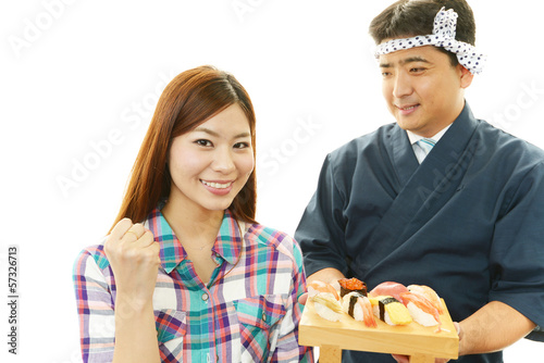 Photo: 寿司を食べる女性 寿司を食べる女性