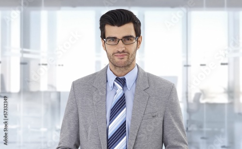 Photo: Corporate businessman at office Corporate businessman at office