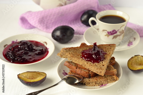 Photo: Toast with plum jam and coffee for breakfast Toast with plum jam and coffee for breakfast