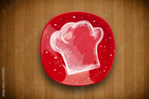 Photo: Colorful plate with hand drawn white chef symbol Colorful plate with hand drawn white chef symbol