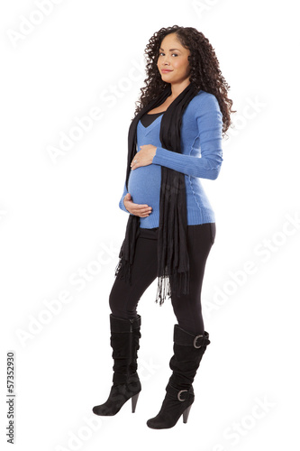 Photo: Pregnant woman in winter clothing. Pregnant woman in winter clothing.
