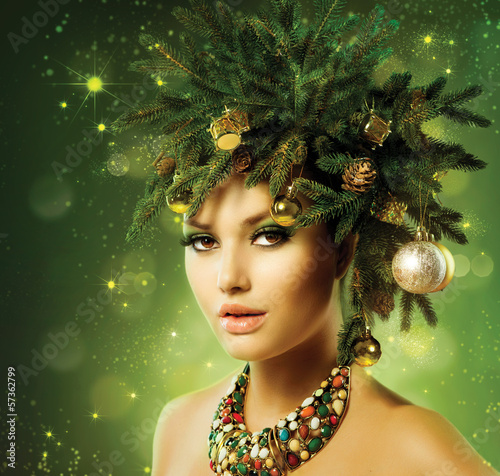 Photo: Christmas Woman. Christmas Tree Holiday Hairstyle and Make up Christmas Woman. Christmas Tree Holiday Hairstyle and Make up