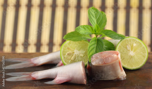 Photo: Rita fish of Southern Asia with mint and lemon Rita fish of Southern Asia with mint and lemon
