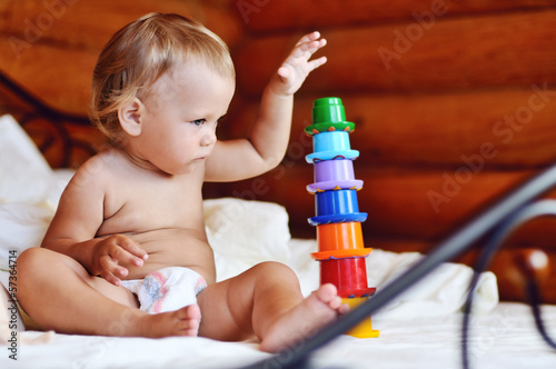 Photo: toddler with toy toddler with toy