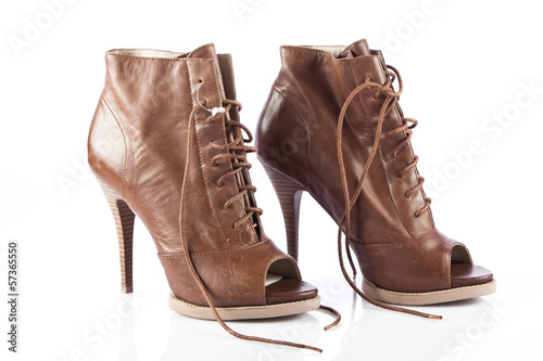 Photo: Woman shoes isolated on white. Nice woman shoes Woman shoes isolated on white. Nice woman shoes