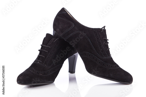Photo: Woman shoes isolated on white. Nice woman shoes Woman shoes isolated on white. Nice woman shoes