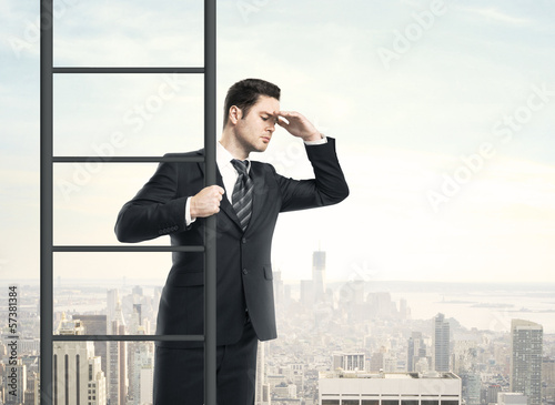 Photo: man climbing on ladder man climbing on ladder